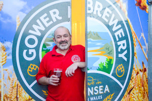 gower brewery founder chris with pint of welsh beer