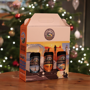 Gower Brewery gift set containing a bottle of Lighthouse Lager, Gower Gold and Gower Power beers in a branded carry box